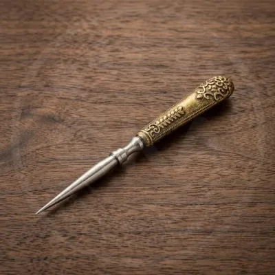 Vintage sewing awl with needle